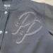 Womens-Pelle-Pelle-Black-Varsity-Jacket-1.webp
